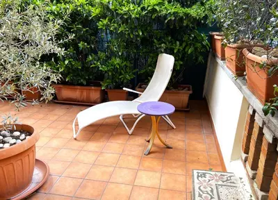 an entrance to a building with an iron gate at Vatican Modern Art apartment in Rome