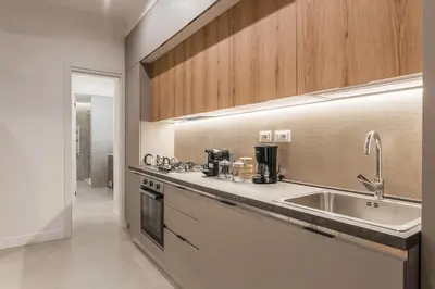 a kitchen with a sink and a counter top at The Best in Rome Orologio in Rome