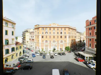 a view of a city with cars parked in a parking lot at Movie Apartment in Rome
