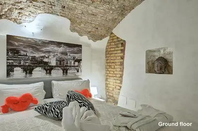 a bedroom with a bed with stuffed animals on it at Casa a Monti in Rome