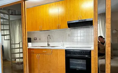 a kitchen with a sink and a stove at PARIOLI LUXURY SUITE III in Rome