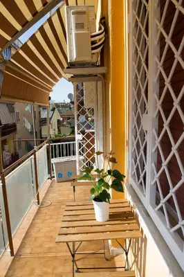 a balcony with a bench and a air conditioner on it at A Casa di Lù a Roma Casa Vacanze in Rome