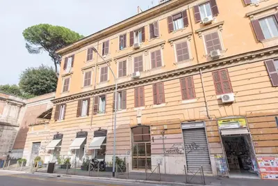 a large building on the side of a street at San Peter's - Cosy Renovated Penthouse in Rome