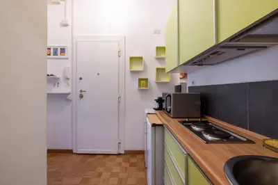 a kitchen with a sink and a counter top at Charming suite with view in the heart of Rome in Rome