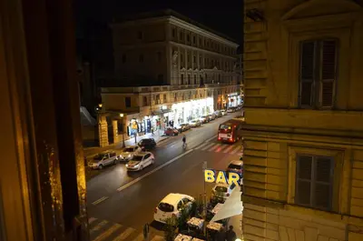 a view of a city street at night with cars at Holiday home Zia Gina in Rome