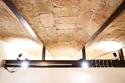 a chandelier hanging from a ceiling in a room at Opera House in Rome