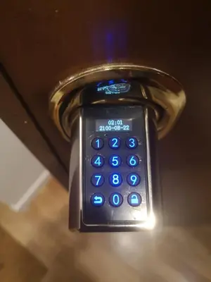 a close up of a cell phone in a door at ad vatican luxury apartment in Rome