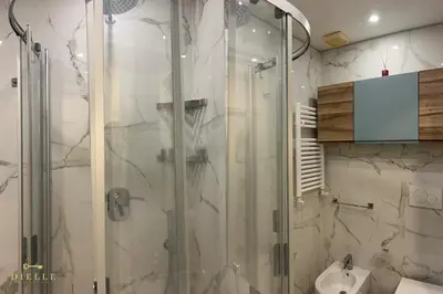 a bathroom with a shower and a sink at Dielle Suite ROMA in Rome