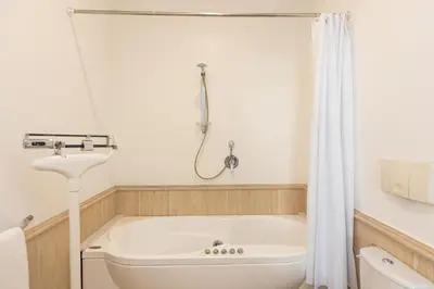 a bathroom with a bath tub and a sink at Amazing Elegant Jewish Ghetto in Rome