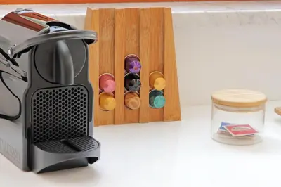 a kitchen counter with a black appliance and a box of donuts at Vatican apartment with parking in Rome