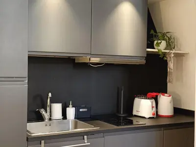a kitchen with a sink and a counter top at viaCatania16 in Rome
