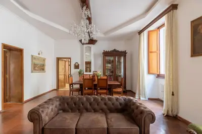 a living room with a couch and a table at iFlat Elegant 3 bedroom apt near the Pantheon in Rome