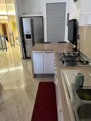 a kitchen with a sink and a stove top oven at Aurelius Holiday Home in Rome