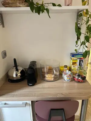 a wooden table with food on top of it at Aurelius Holiday Home in Rome