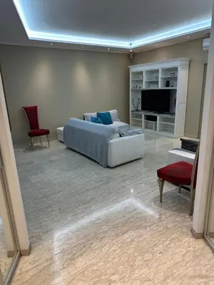 a bedroom with a bed and a couch and a tv at Aurelius Holiday Home in Rome