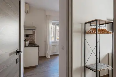 a balcony with a view of a building at GuestHost - Monteverde Vecchio Apartment in Rome