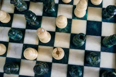 a close up of a chessboard with bottles on it at Datama House in Rome