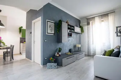 a living room with a couch and a table at Datama House in Rome