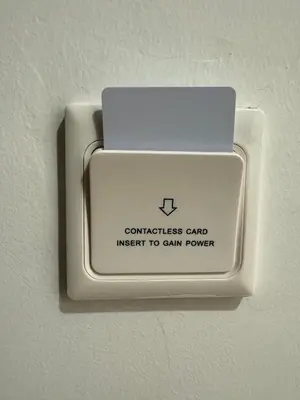 a lightswitch with a laptop on it on a wall at Sweet House via dei gracchi in Rome
