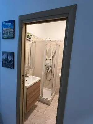 a bathroom with a shower and a sink at centro stazione tuscolana in Rome