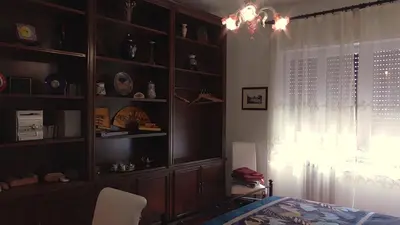 a bedroom with a bed and a window at Italian romance - A fine apartment in Rome in Rome