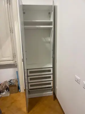 a empty refrigerator with its door open in a room at Greg Roma in Rome