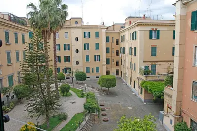 a view of a courtyard in a city with buildings at Valerio’s House in Rome