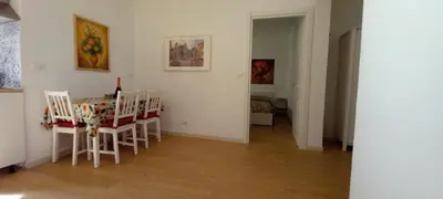 a dining room with a table and chairs at Domus Appio Latino - Parco Appia Antica in Rome