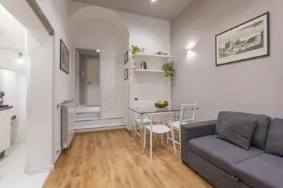 a living room with a couch and a table at Sweet House Campo de’ Fiori in Rome