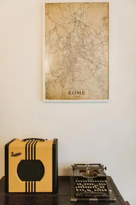 a picture of a home office with an old typewriter at Casa Riva 1920 in Rome