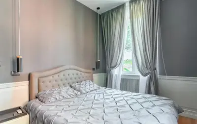 a bedroom with a bed and a window at Vatican Home 51 in Rome