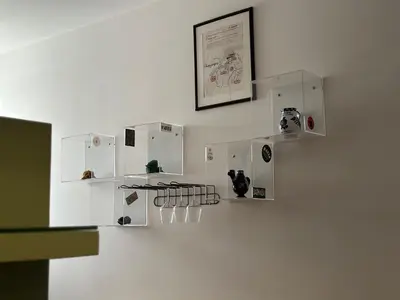 a white wall with several white appliances on it at San Giovanni Apartment in Rome