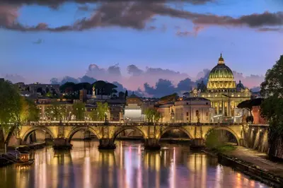a bridge over a river with a building at 3 min da Stazione San Pietro in Rome