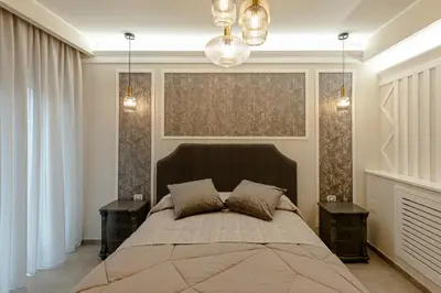 a bedroom with a large bed with two night stands at Bed & Breakfast Il Narciso in Rome