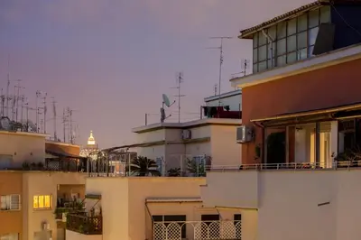 a view of a building with balconies on it at Vatican R-Home Savorelli in Rome