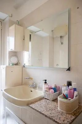 a bathroom with a sink and a counter top at Cerroni's Corner in Rome