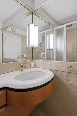 a bathroom with a sink and a large mirror at Star Beauty House in Rome