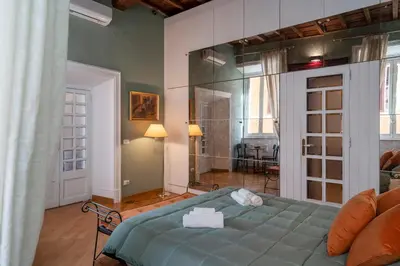 a bedroom with a large bed in a room at Star Beauty House in Rome