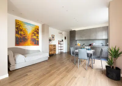 a living room with a couch and a table at Vatican family loft in Rome