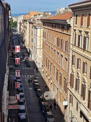 an overhead view of a city street with parked cars at Appartamento-Castro Pretorio in Rome