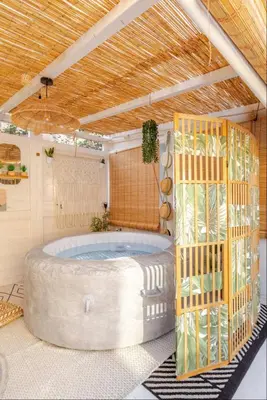 a bathroom with a large tub in a room at Vita lenta Roma Pigneto terrazza in Rome