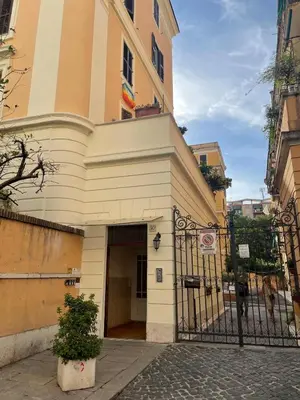 a building with a gate in front of it at Steph and Lorenzo's place in Rome