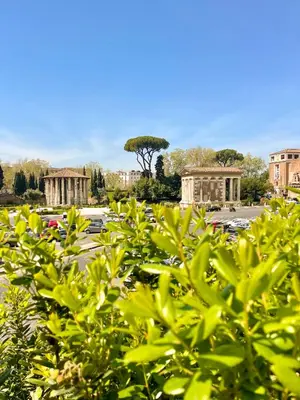 a view of a parking lot with buildings in the background at Velabro Luxury Loft in Rome