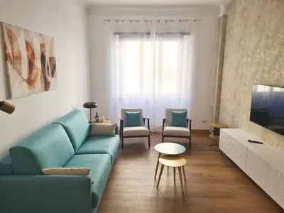 a bedroom with a bed and a large window at RomeBestHome Beccaria - Piazza del Popolo in Rome