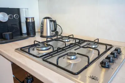 a stove top oven sitting on top of a kitchen counter at Vatican - Angolo di Roma in Rome