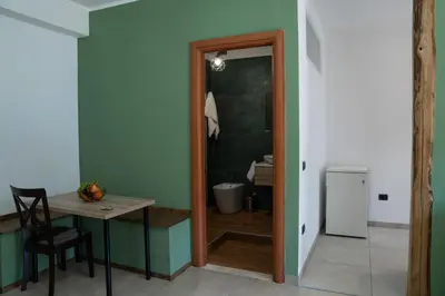 a bathroom with a shower and a toilet and a sink at Wild Luxury Home in Rome