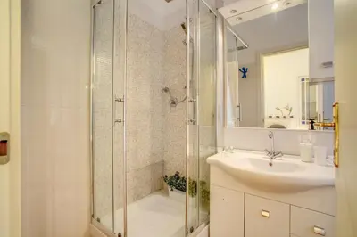 a bathroom with a shower and a sink at Liberty House in Rome