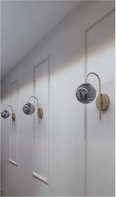 a shower with two lights and two mirrors at Miracol in Rome