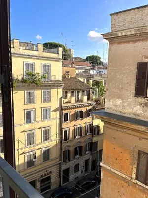 a view from the window of a building at Trevi over the top apartment in Rome