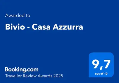 a blue sign with the text emailed to binyo caasza akira at Bivio - Casa Azzurra in Rome